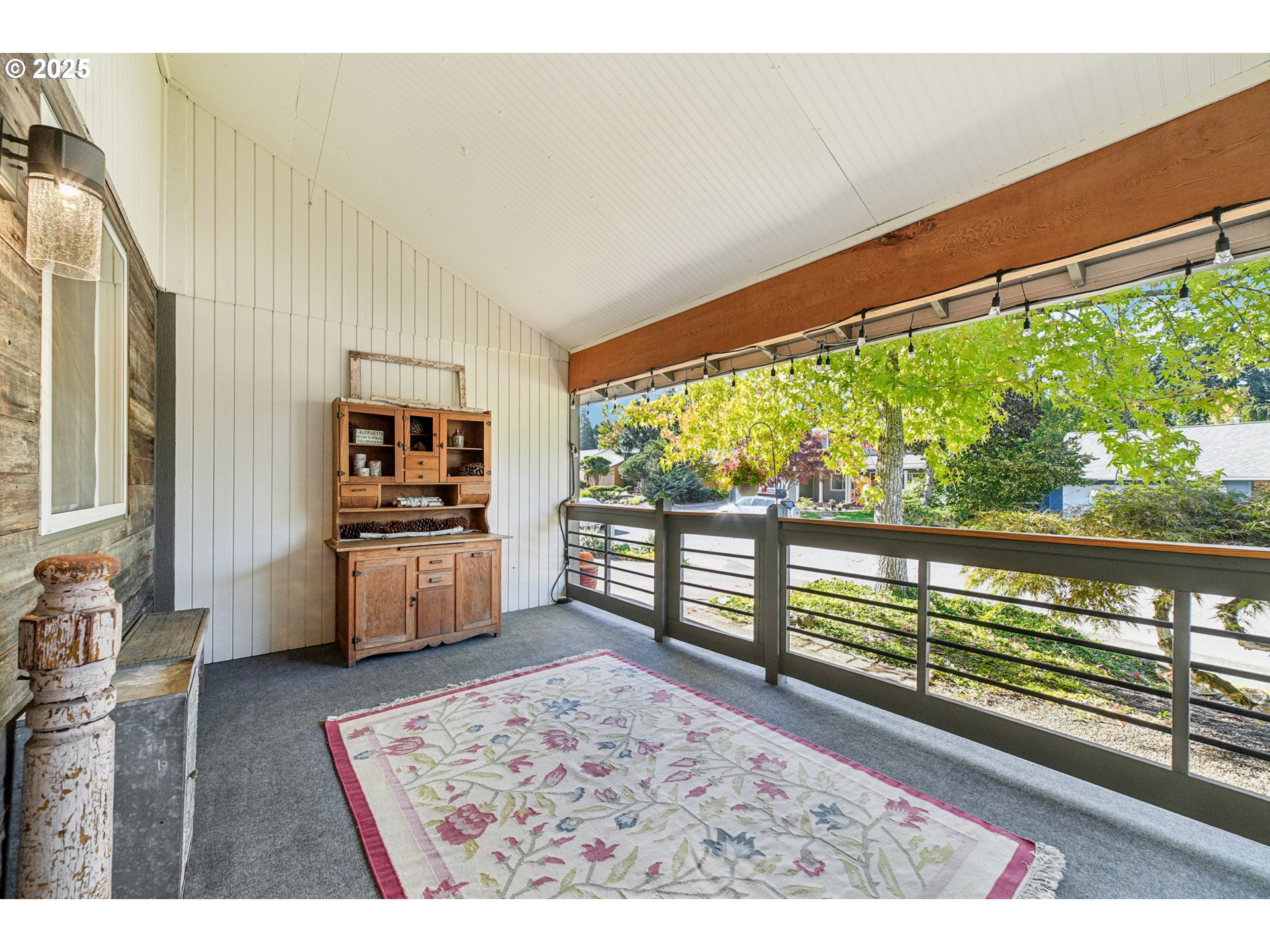 17226 Southwest Baker Street Beaverton, OR 97007 - Photo 26 of 34 a living room with furniture and a large window