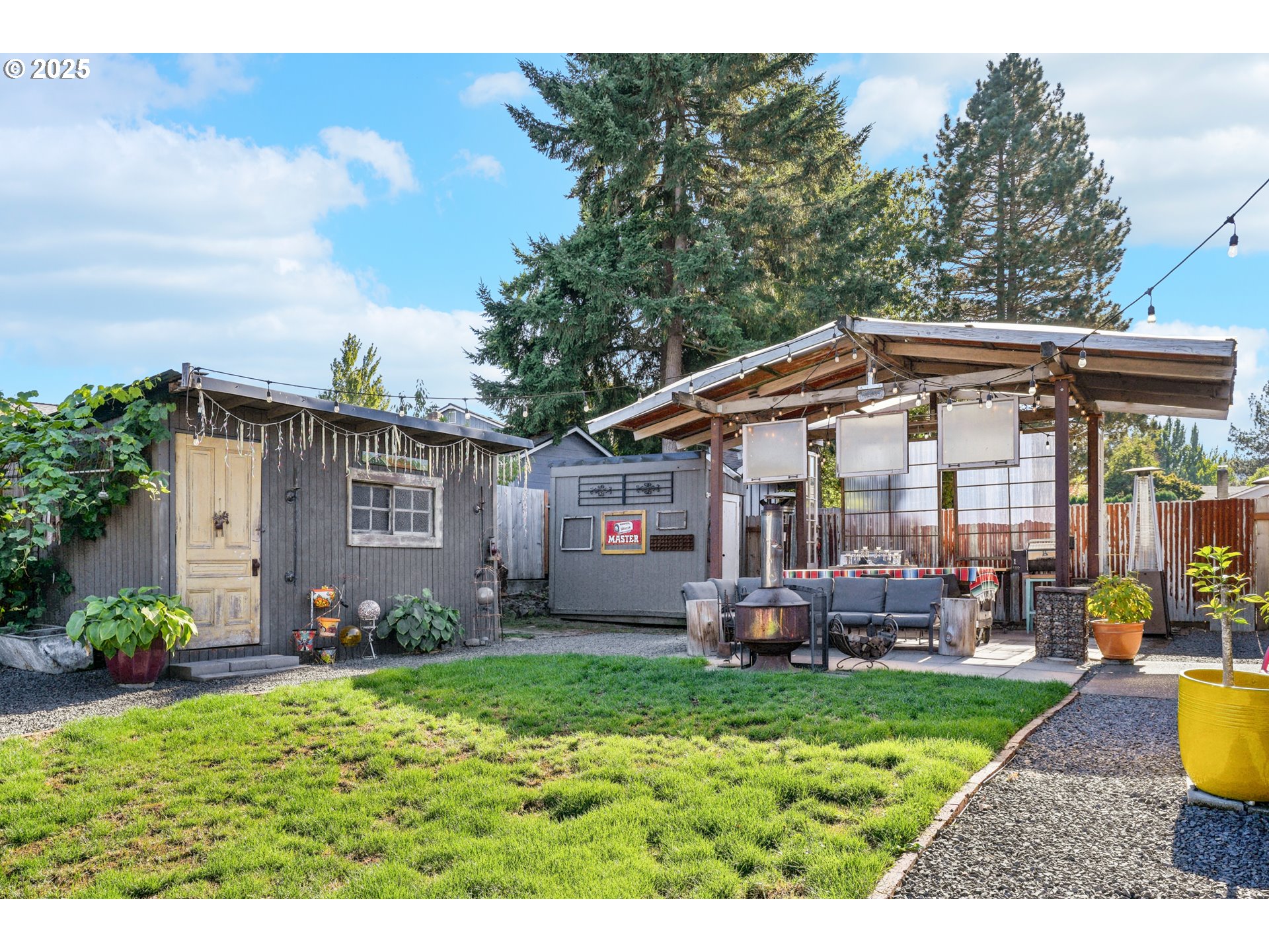 17226 Southwest Baker Street Beaverton, OR 97007 - Photo 29 of 34 a view of a house with a yard and sitting area