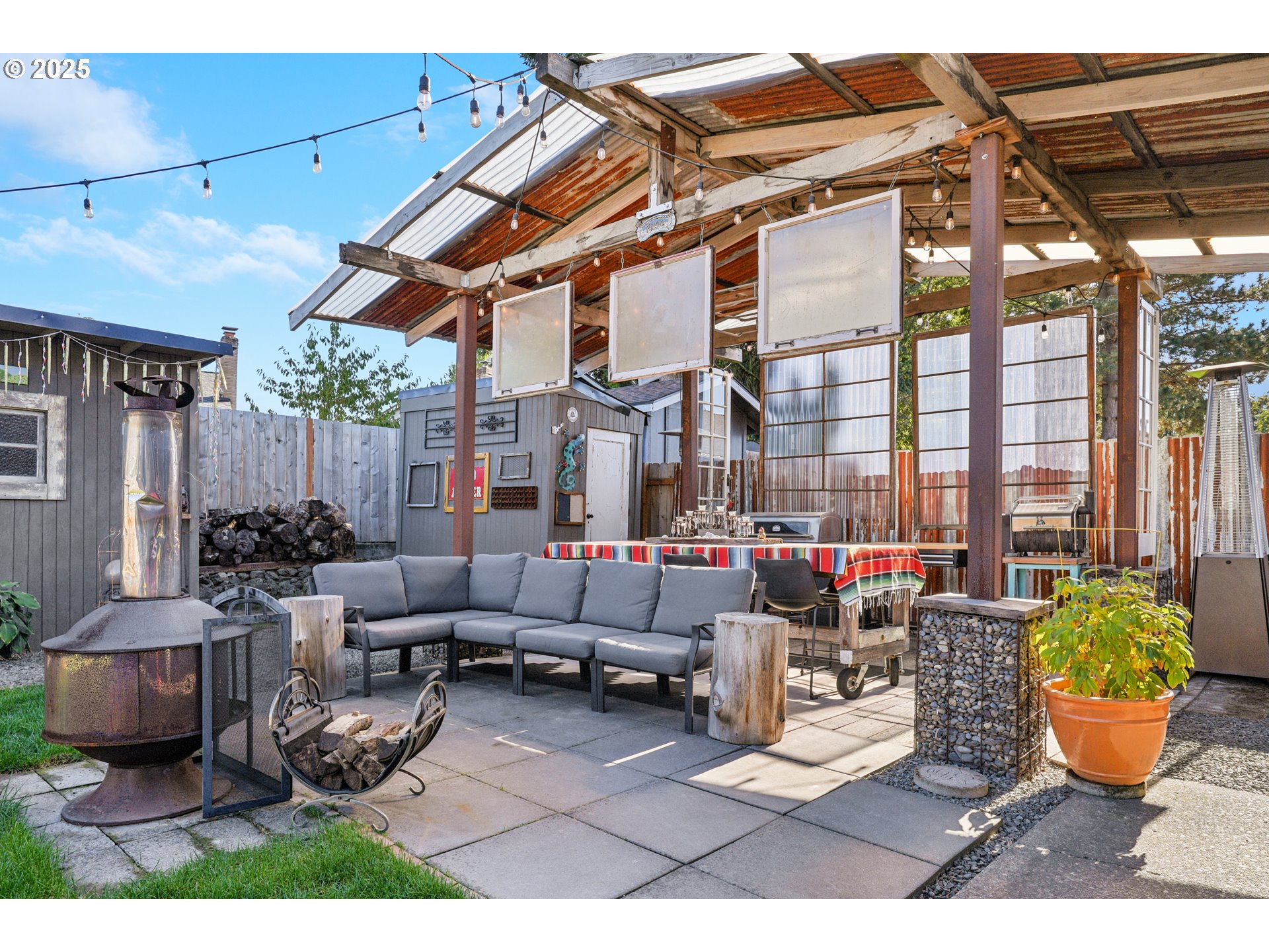 17226 Southwest Baker Street Beaverton, OR 97007 - Photo 30 of 34 a living room with patio furniture and a potted plant