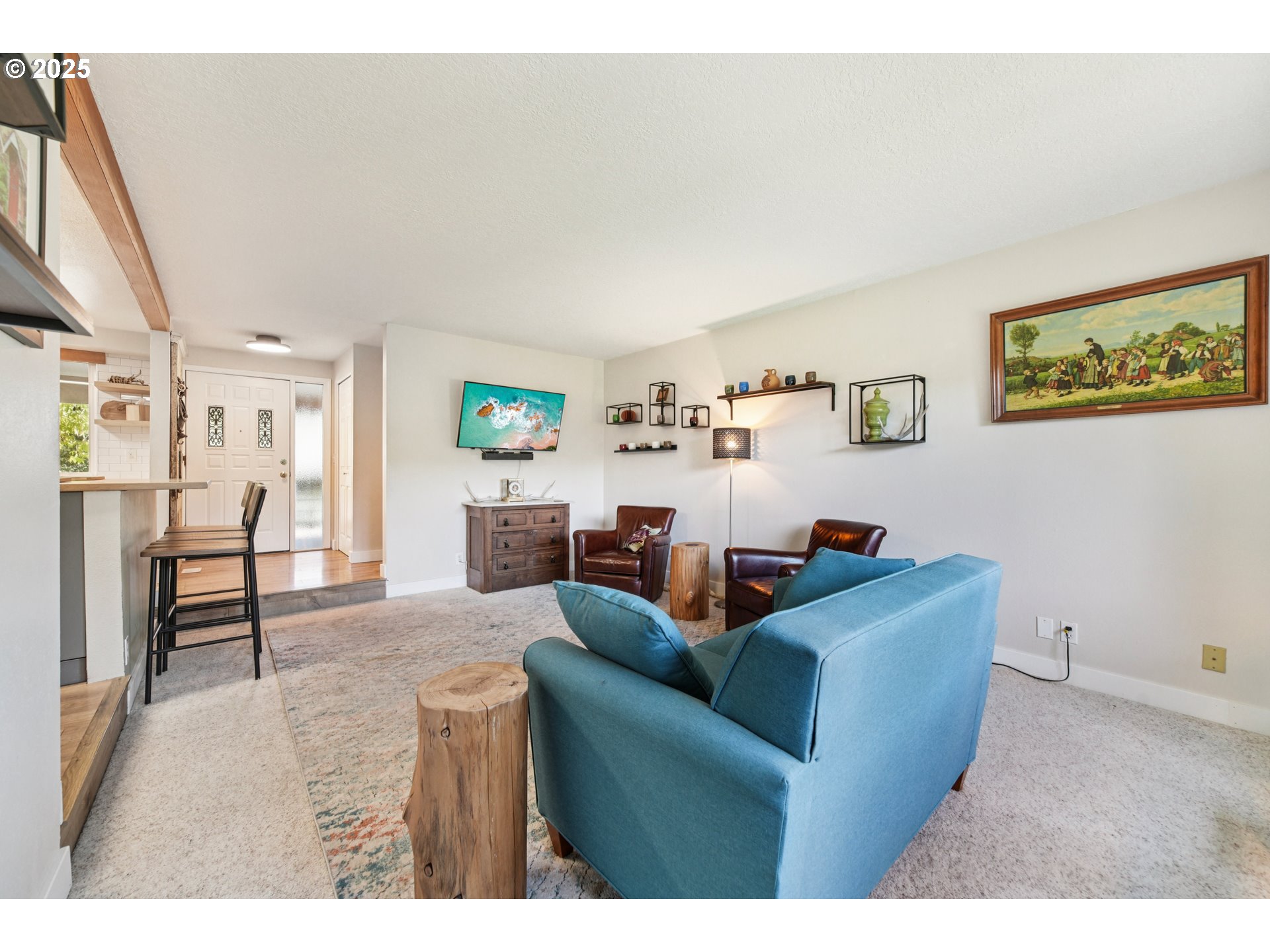 17226 Southwest Baker Street Beaverton, OR 97007 - Photo 6 of 34 a living room with furniture and a dining table