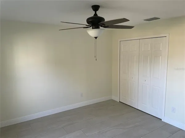 a view of a room with a fan