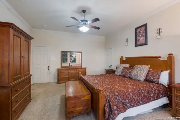 a bedroom with a bed and furniture