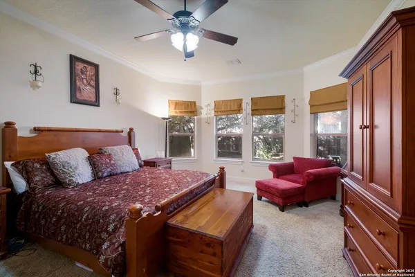 a bed room with a bed and a couch