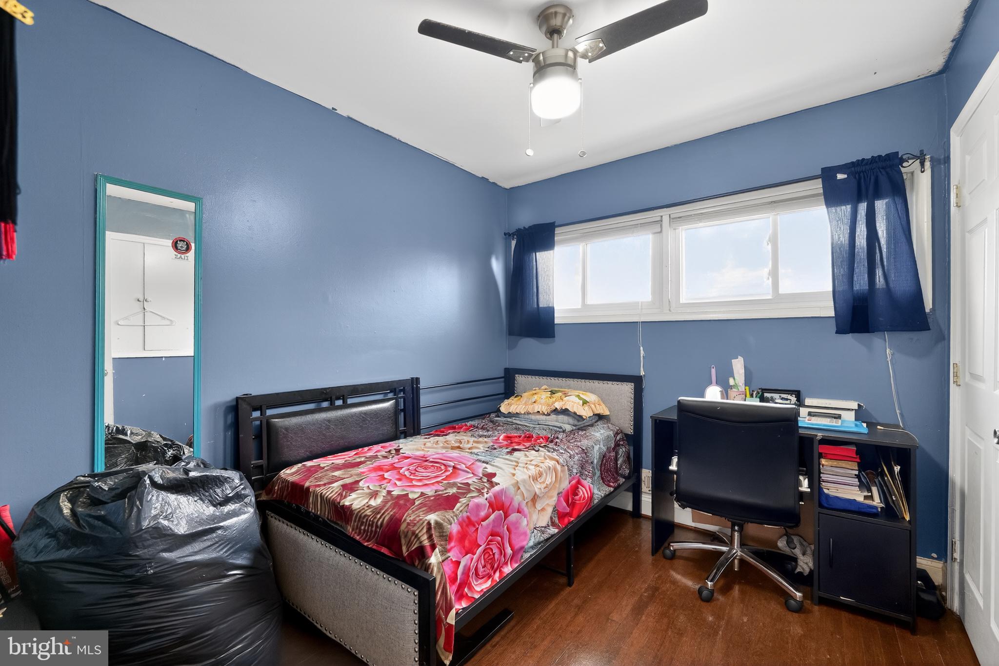 5909 Charnwood Road Catonsville, MD 21228 - Photo 20 of 31 Cozy bedroom with vibrant decor.