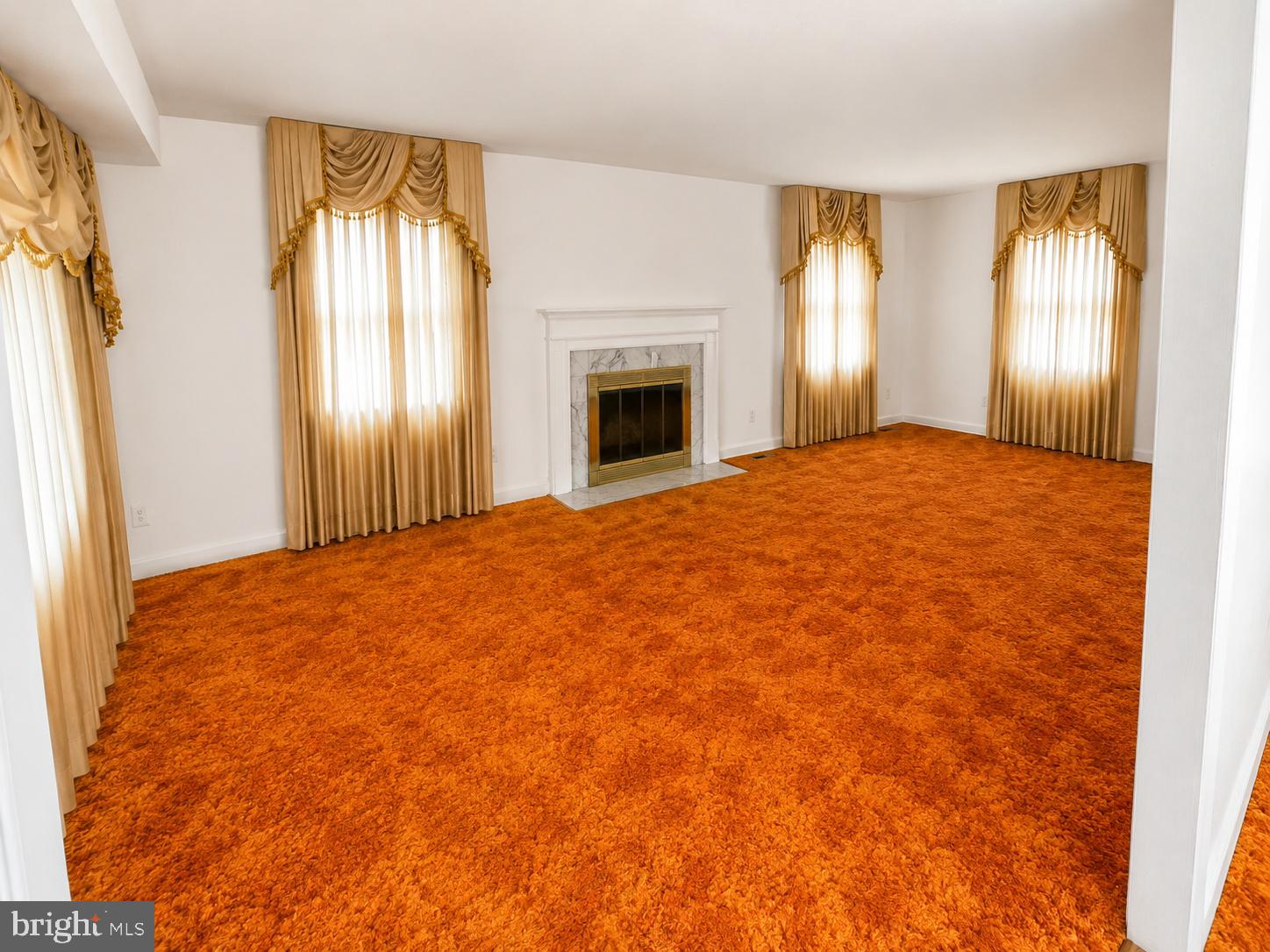 33 Timber Lane Willingboro, NJ 08046 - Photo 20 of 31 a big room with windows and a fireplace