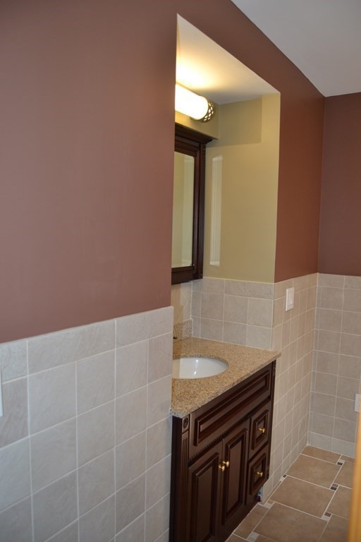 61 Monson Road Wales, MA 01081 - Photo 14 of 41 a bathroom with a sink and a mirror