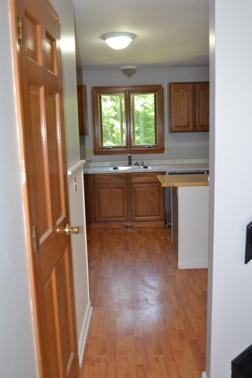 61 Monson Road Wales, MA 01081 - Photo 26 of 41 a room with window and cabinets