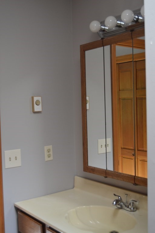 61 Monson Road Wales, MA 01081 - Photo 33 of 41 a bathroom with a sink and a mirror