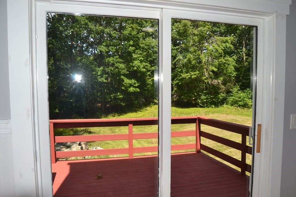 61 Monson Road Wales, MA 01081 - Photo 5 of 41 a view of a large window with an outdoor space