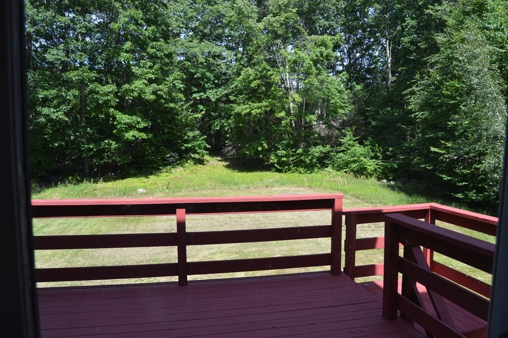 61 Monson Road Wales, MA 01081 - Photo 6 of 41 a view of a bench in a yard