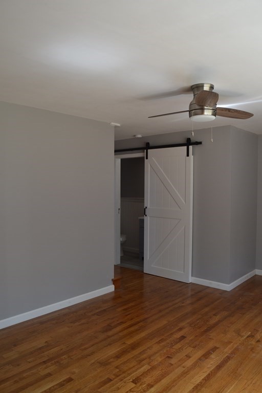 61 Monson Road Wales, MA 01081 - Photo 9 of 41 a view of empty room with wooden floor