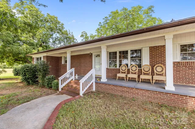a house view with a backyard space