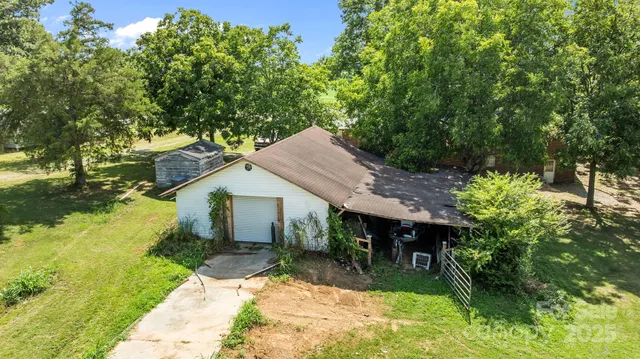 a view of a lake with a yard