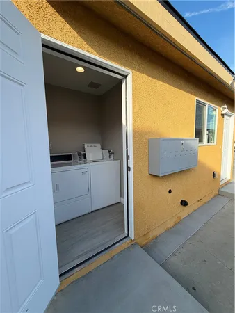 a view of kitchen and utility room