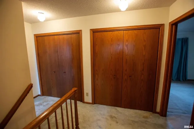 $300,000 | 591 Breezy Point Drive, Clinton, IA 52732