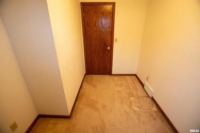 $300,000 | 591 Breezy Point Drive, Clinton, IA 52732