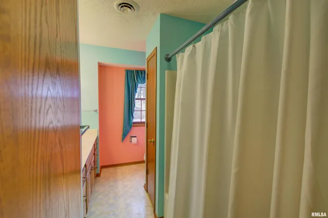 $300,000 | 591 Breezy Point Drive, Clinton, IA 52732