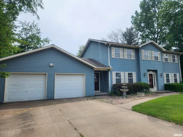 $300,000 | 591 Breezy Point Drive, Clinton, IA 52732