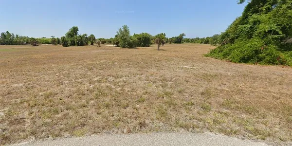 a view of an outdoor space and a yard