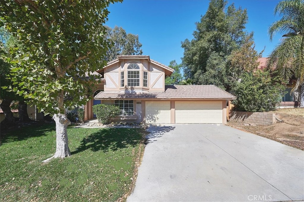 24384 Rimview Road Moreno Valley, CA 92557 - Photo 1 of 1 a front view of a house with a yard
