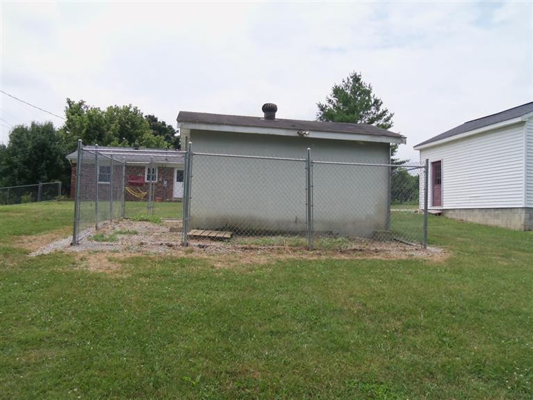 310 Delaney Ferry Road Versailles, KY 40383 - Photo 7 of 40 This block building has roollup door and
