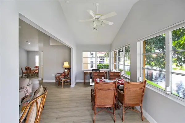a view of a livingroom with furniture and wooden floor