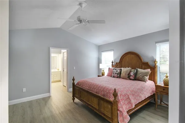 a bedroom with a bed and furniture