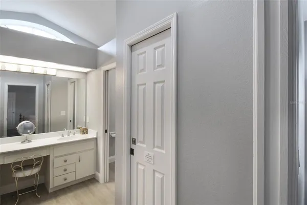 a bathroom with a sink double vanity and shower