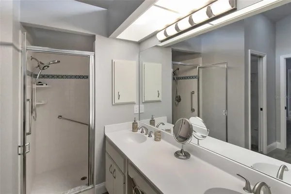 a bathroom with a sink toilet and vanity