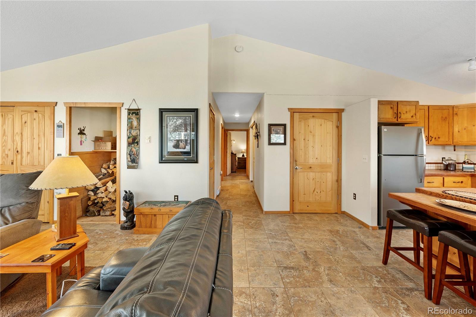 47 Piute Way Como, CO 80432 - Photo 16 of 50 a living room with furniture and a table