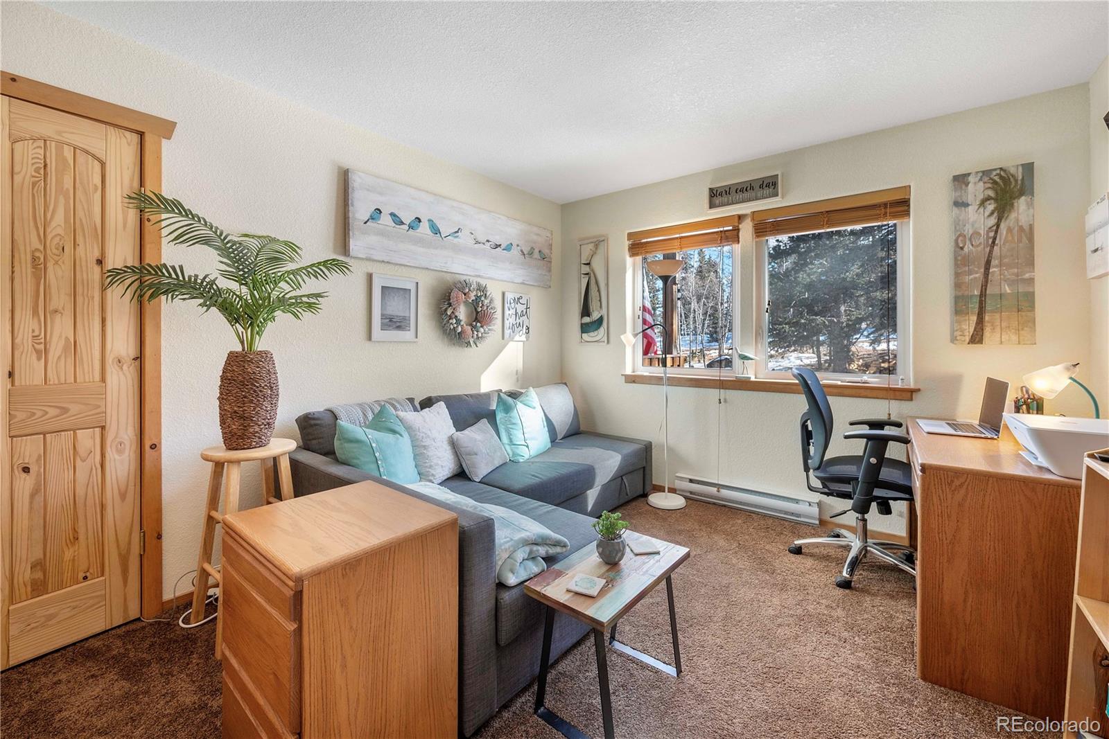 47 Piute Way Como, CO 80432 - Photo 27 of 50 a living room with furniture and a window