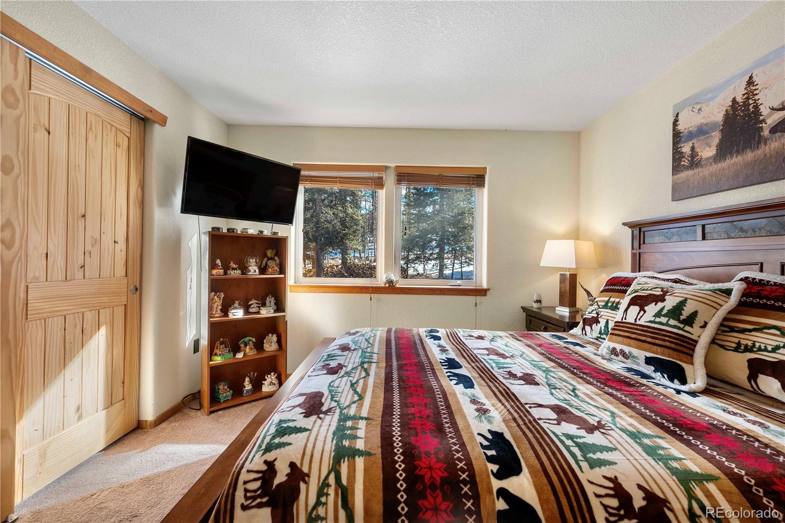 47 Piute Way Como, CO 80432 - Photo 31 of 50 a bed sitting in a bedroom next to a window