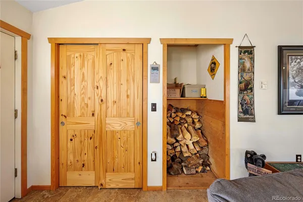 a bathroom with a toilet and a shower curtain