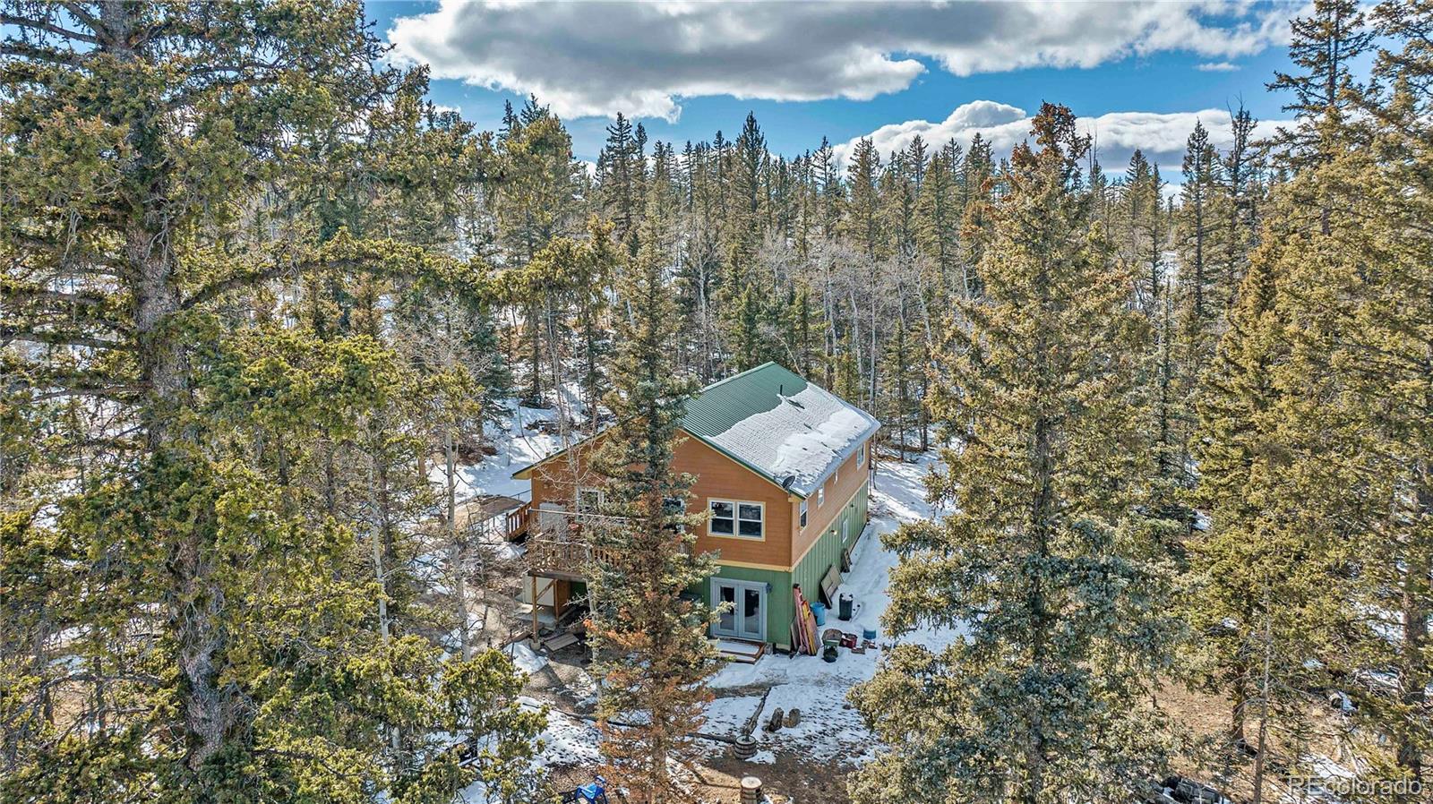 47 Piute Way Como, CO 80432 - Photo 4 of 50 a picture of a building in front of yard