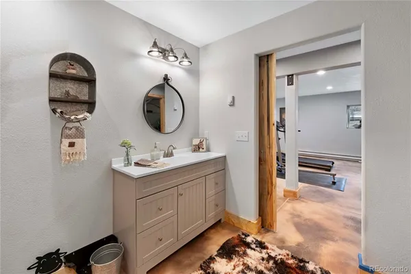 a living room with a couch and a table