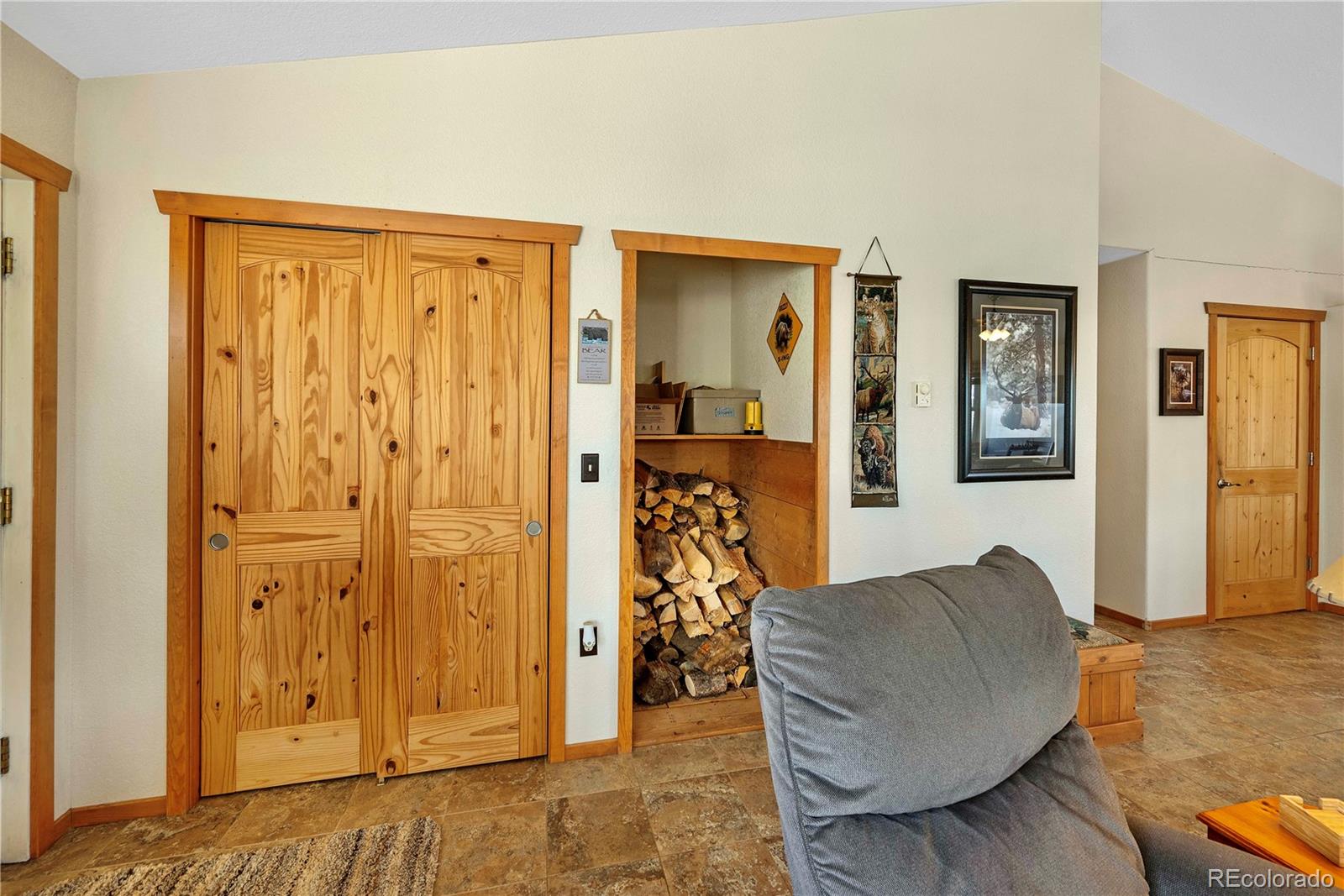 47 Piute Way Como, CO 80432 - Photo 10 of 50 a living room with furniture and a wooden floor