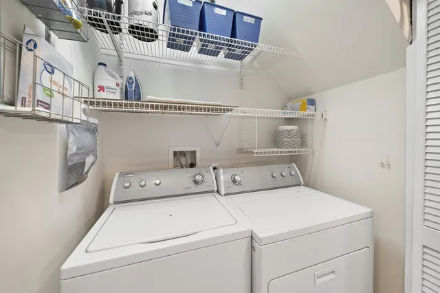 a view of a balcony with a bench