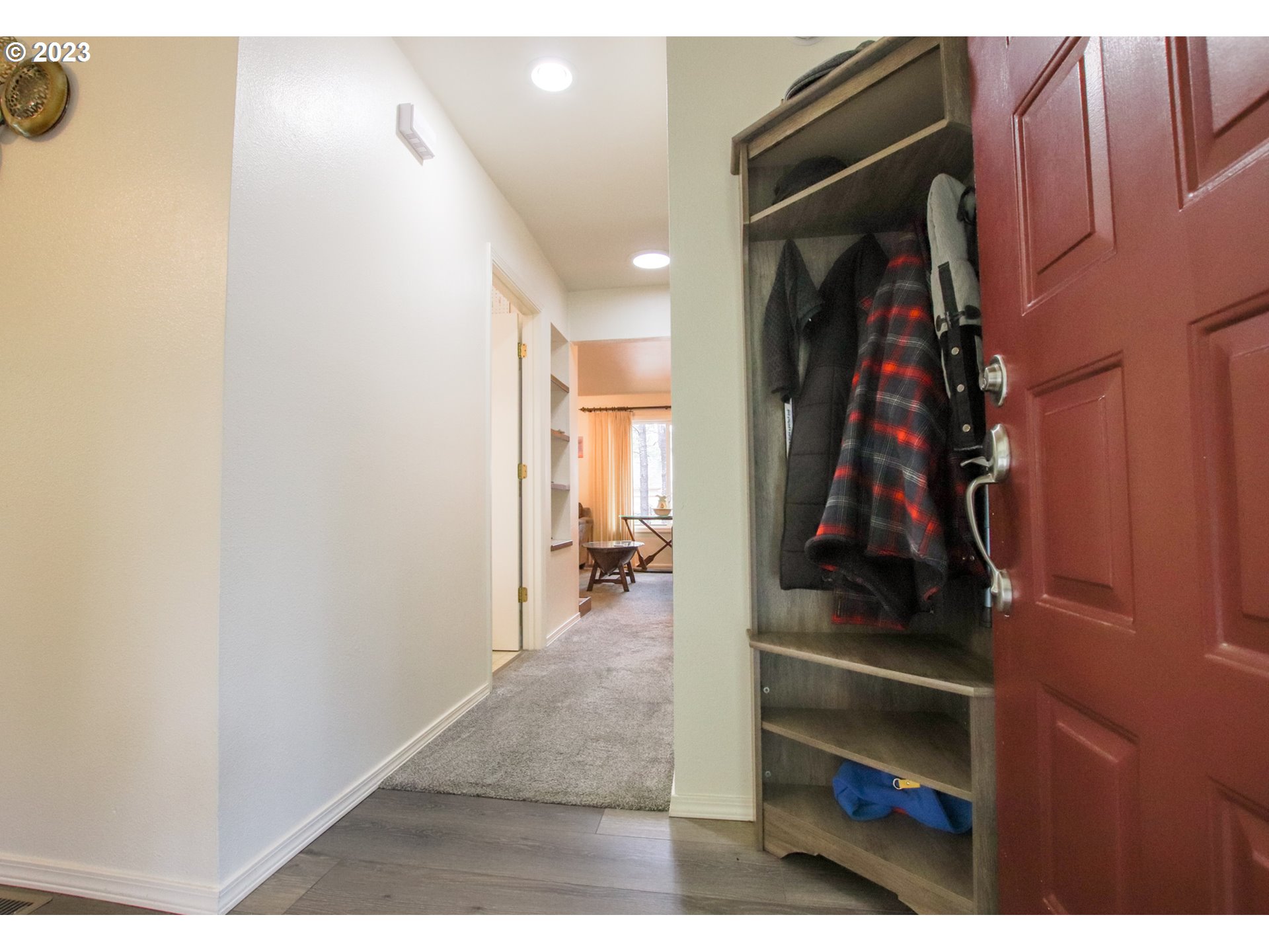 2240 23rd Street Florence, OR 97439 - Photo 12 of 37 a view of walk in closet with clothes and shoes