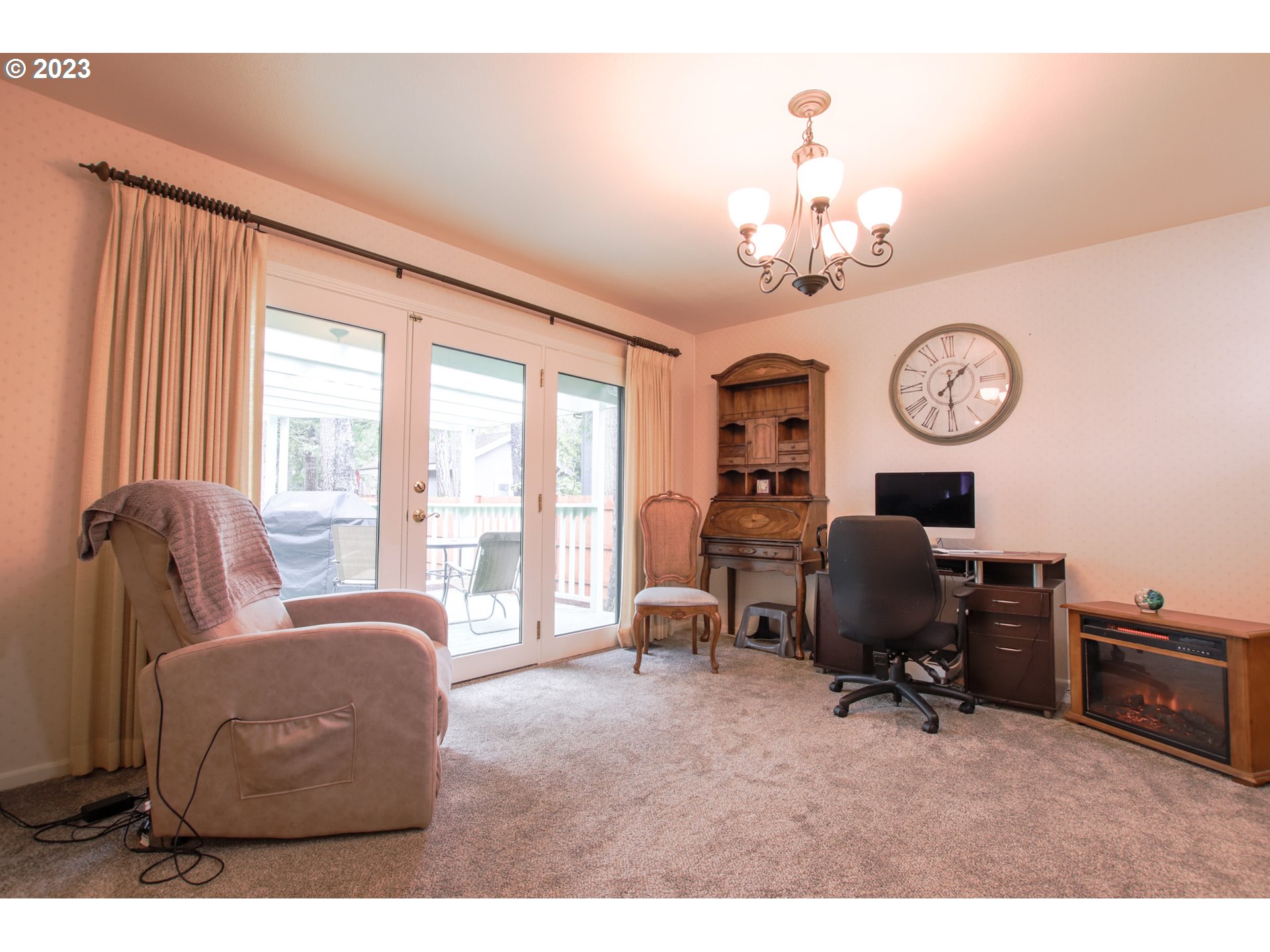 2240 23rd Street Florence, OR 97439 - Photo 18 of 37 a view of a livingroom with furniture and a large window