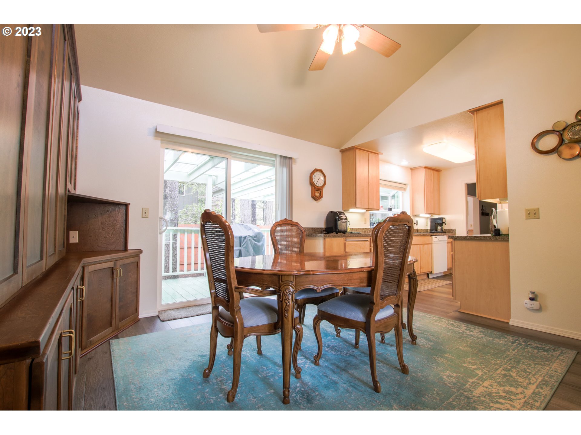 2240 23rd Street Florence, OR 97439 - Photo 22 of 37 a view of a dining room with furniture and a window