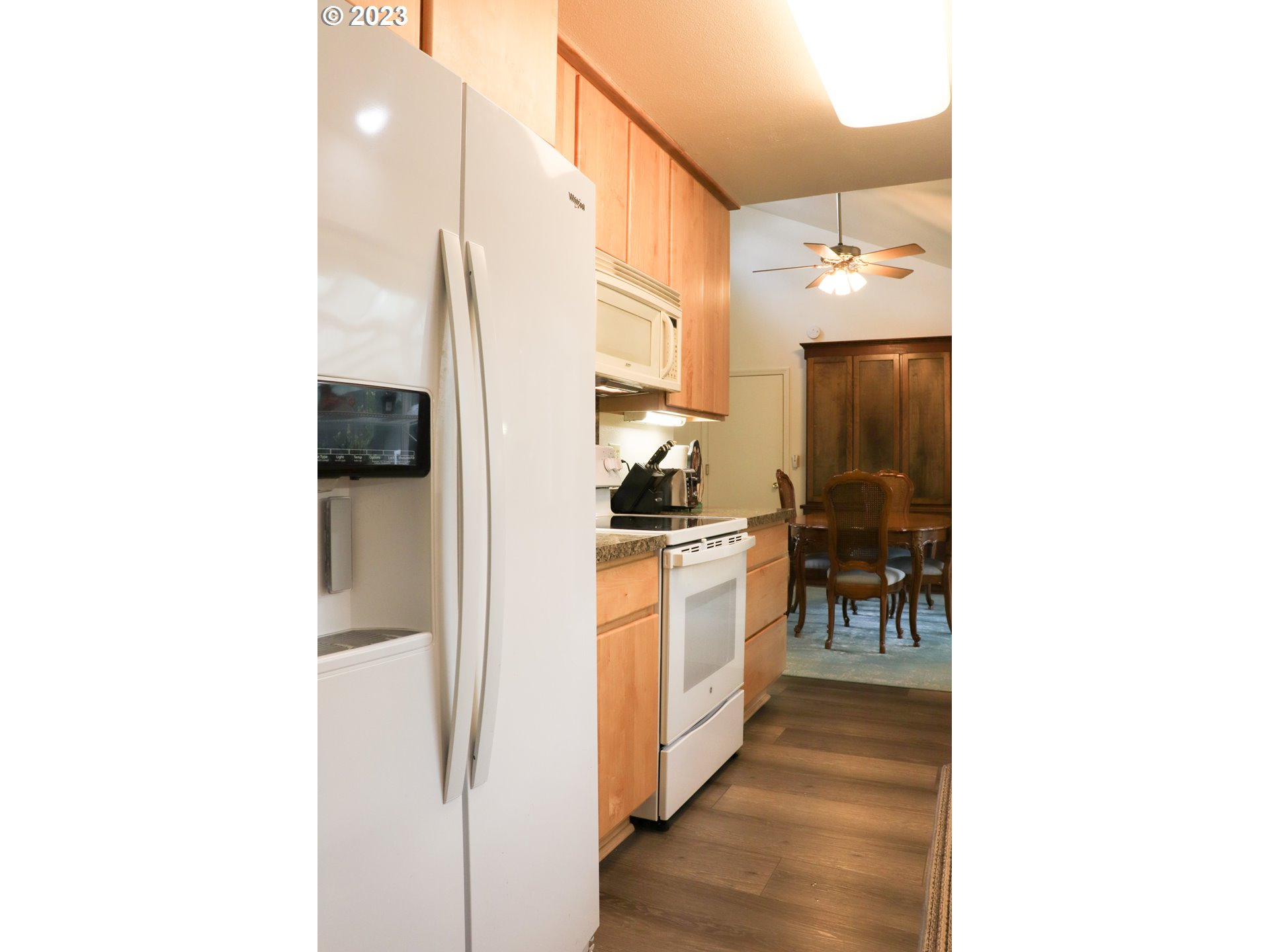 2240 23rd Street Florence, OR 97439 - Photo 24 of 37 a picture of a bathroom with a sink and a refrigerator