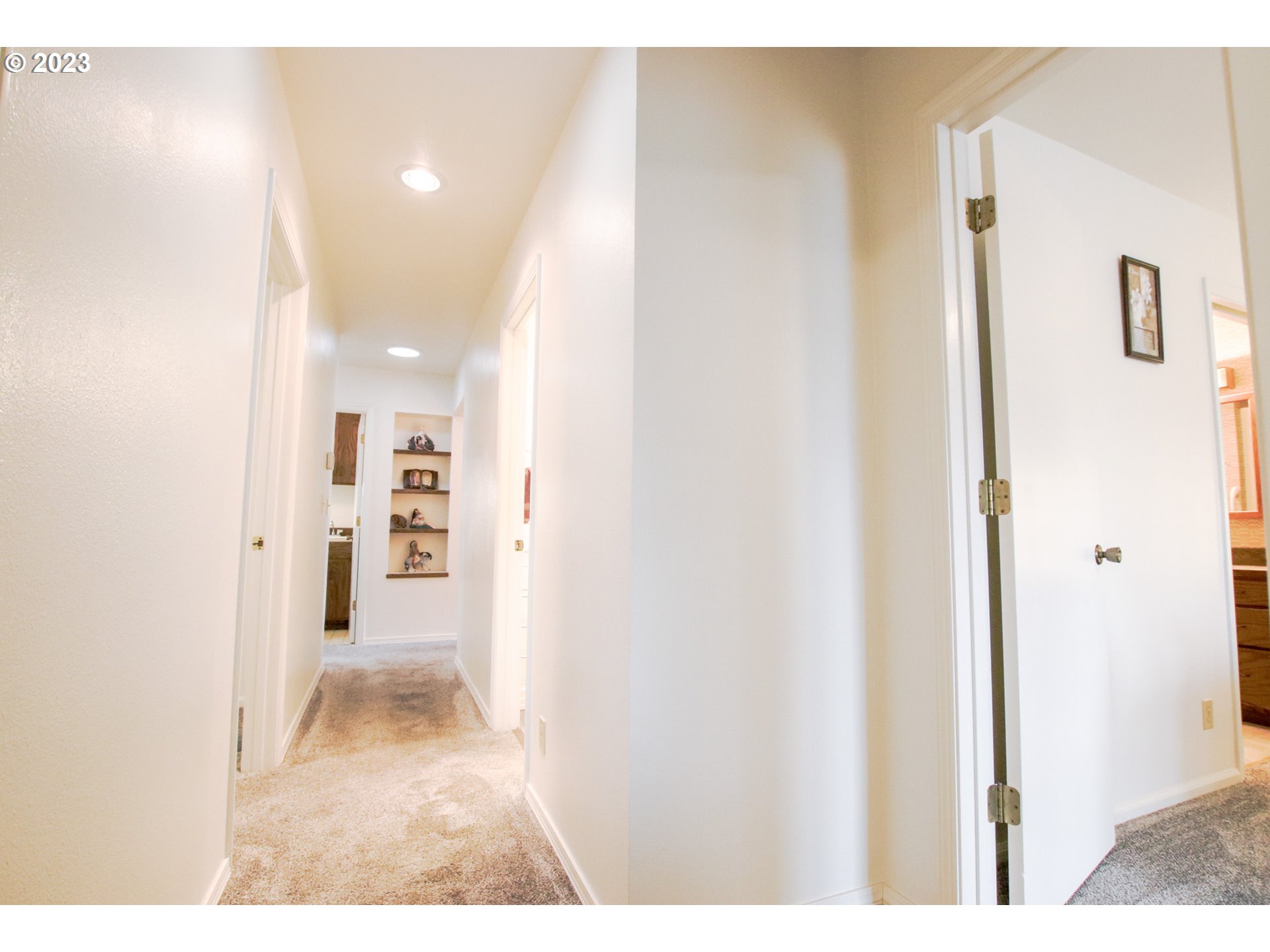 2240 23rd Street Florence, OR 97439 - Photo 31 of 37 a view of a hallway with a dining area