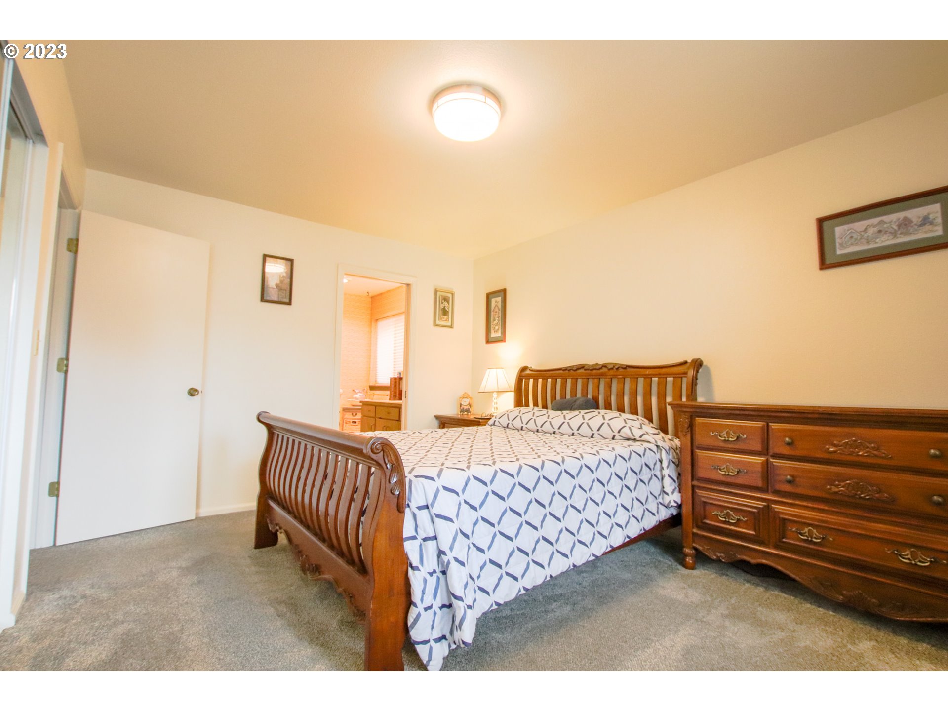 2240 23rd Street Florence, OR 97439 - Photo 37 of 37 a bedroom with furniture and window