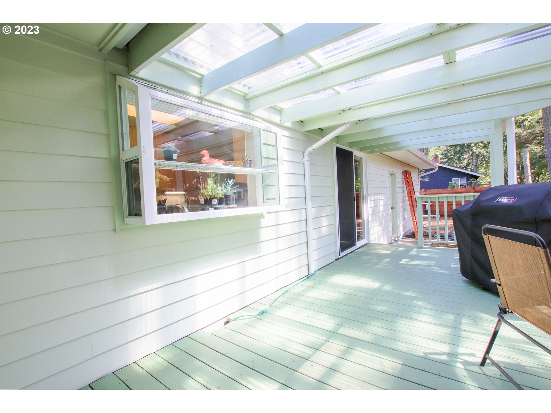 2240 23rd Street Florence, OR 97439 - Photo 7 of 37 a view of a room with wooden floor and furniture