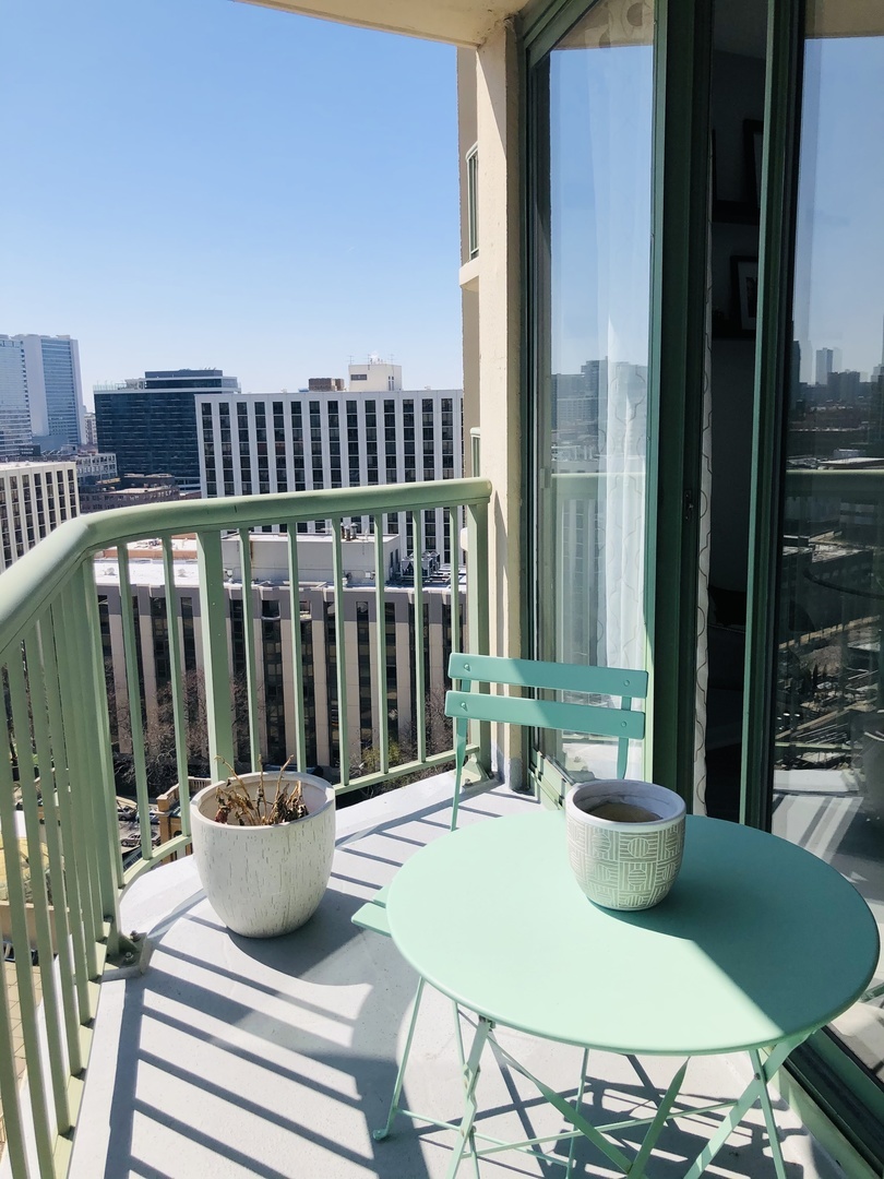 111 West Maple Street, Unit 1309 Chicago, IL 60610 - Photo 11 of 14 a view of balcony and patio