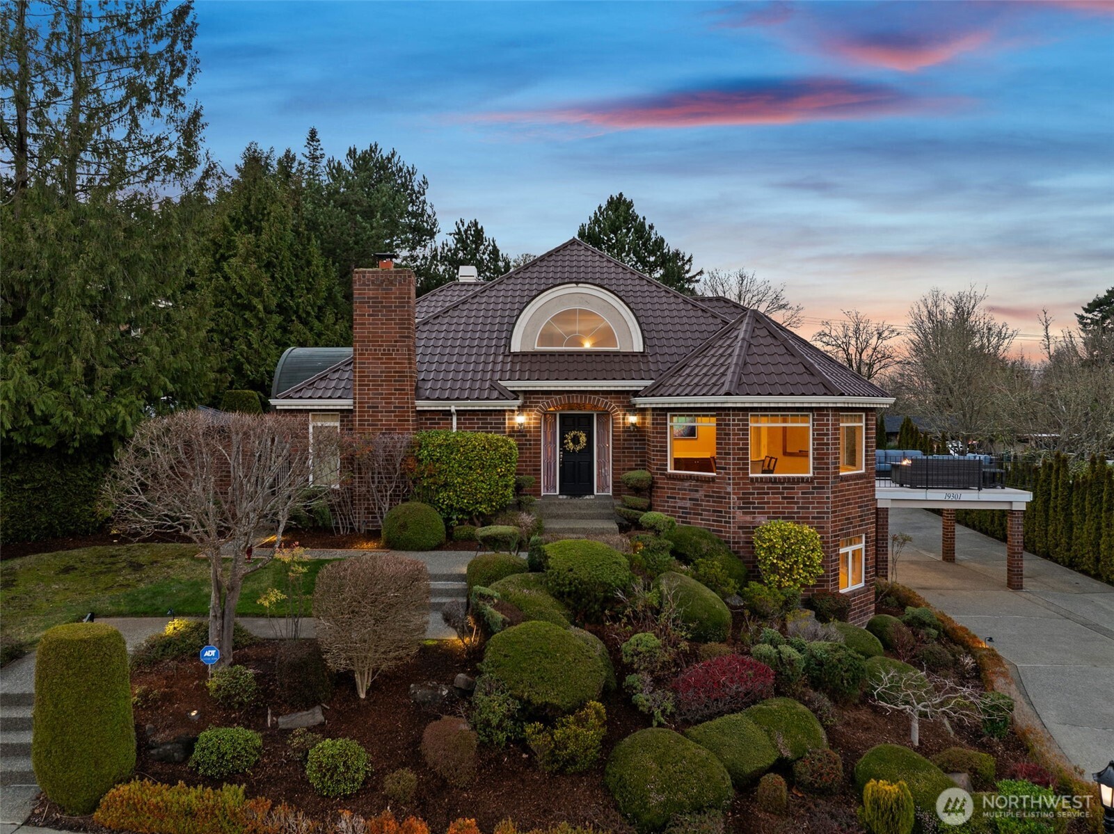 19301 4th Place Southwest Normandy Park, WA 98166 - Photo 1 of 37 a front view of a house with a yard