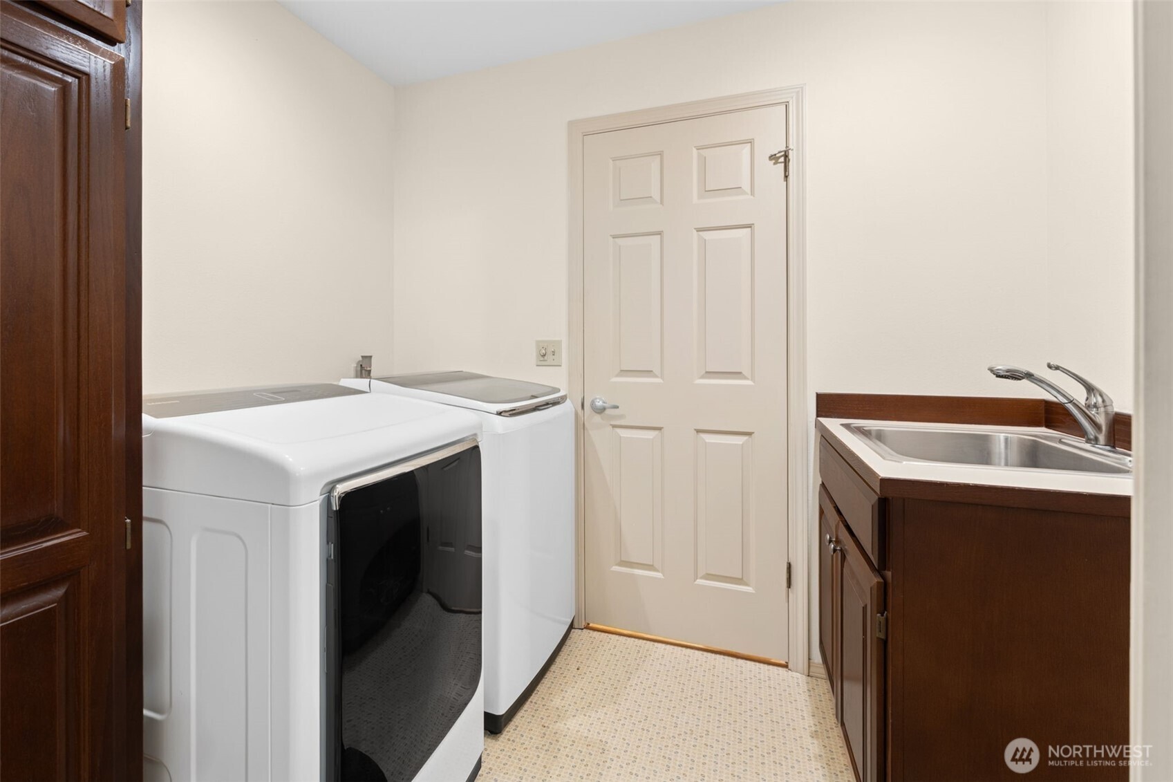 19301 4th Place Southwest Normandy Park, WA 98166 - Photo 19 of 37 a utility room with sink dryer and washer