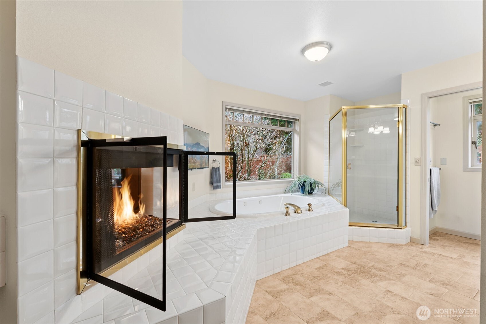 19301 4th Place Southwest Normandy Park, WA 98166 - Photo 21 of 37 a spacious bedroom with a bed and a large mirror