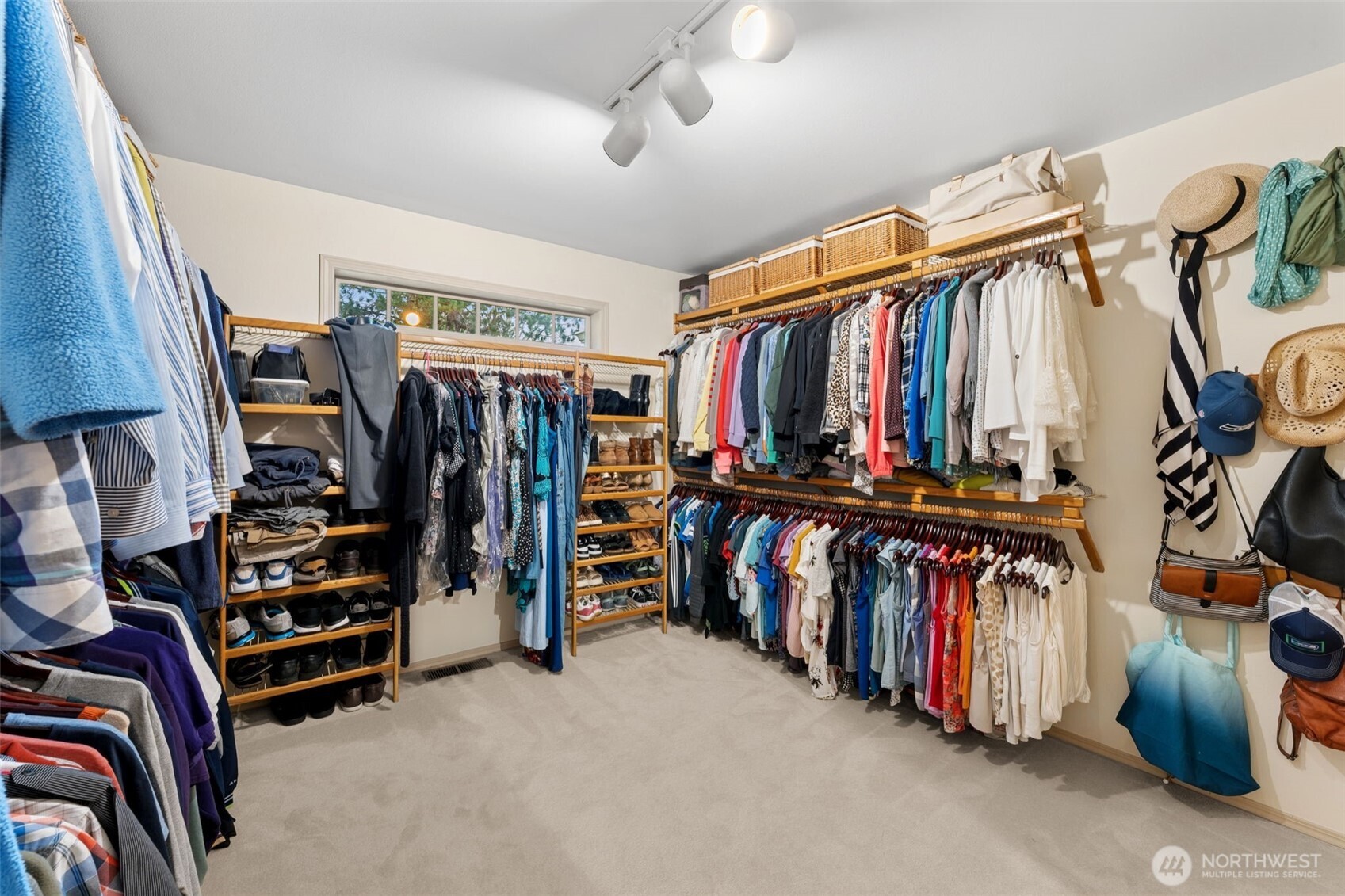 19301 4th Place Southwest Normandy Park, WA 98166 - Photo 23 of 37 a view of walk in closet with clothes