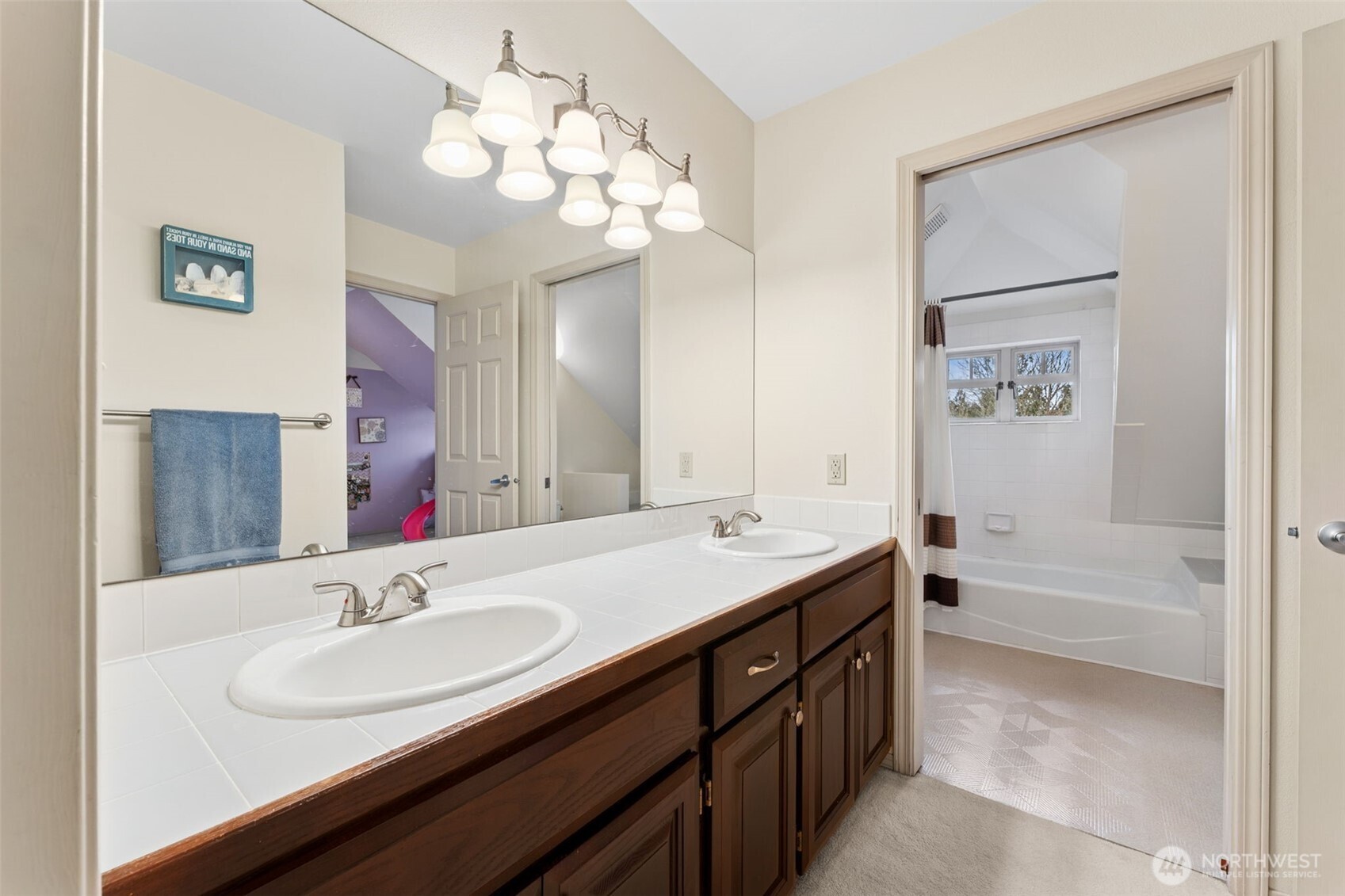 19301 4th Place Southwest Normandy Park, WA 98166 - Photo 25 of 37 a bathroom with a sink double vanity granite tub and a mirror